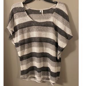 Maurice’s studio Y large glitter top